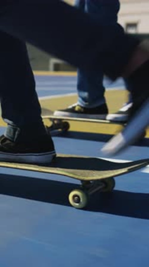 People, legs and sneakers with skateboard trick on pitch for outdoor flip, skill or talent