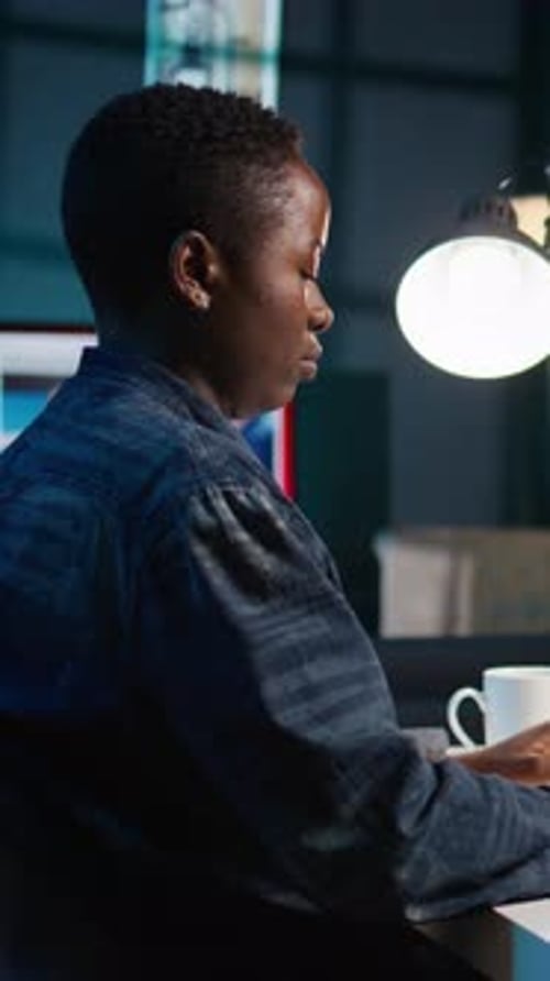 Vertical Video Artificial Intelligence Engineer Working From Home Using Notebook