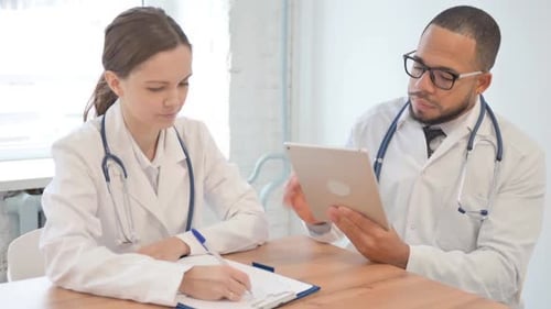 Team of Doctors Working Together in Hospital