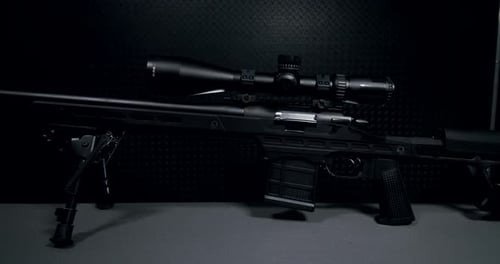 Black Sniper Rifle on Dark Background