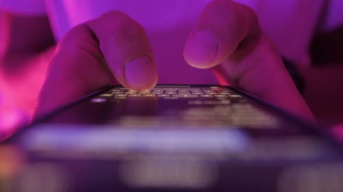 Woman Chatting Online on Smartphone Macro Close Up Typing Text Message Touching Touchscreen Keyboard