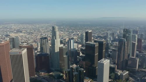 AERIAL: Wide View of Downtown Los Angeles, California Skyline at Beautiful Blue Sky and Sunny Day