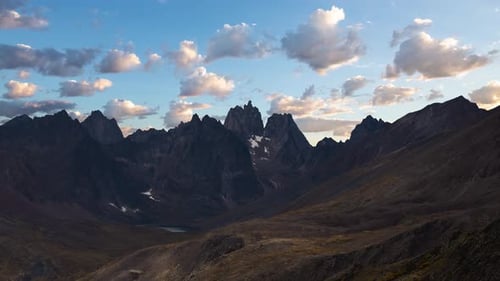 Time Lapse. Beautiful View of Scenic Mountains and Landscape at Sunset.