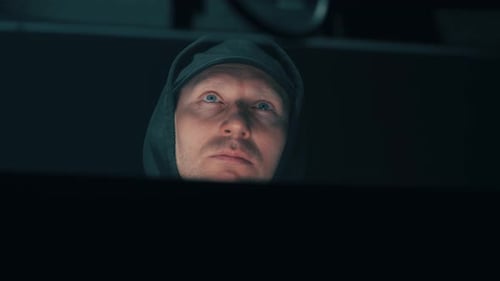 Cyber Thief Looking at Screen