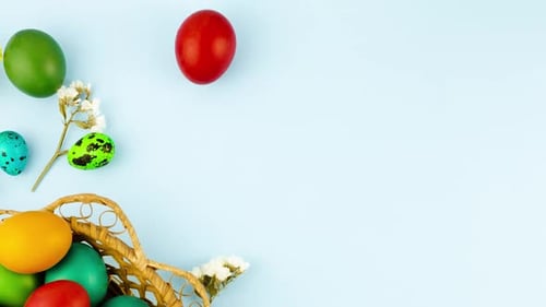 Colorful Painted Easter Eggs in Wicker Basket