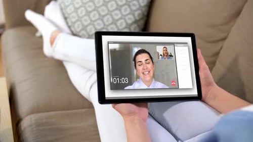 Woman Having Video Call on Tablet Computer at Home 124