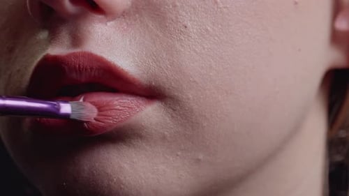 Applying Red Lipstick with Brush, Extreme Close-Up