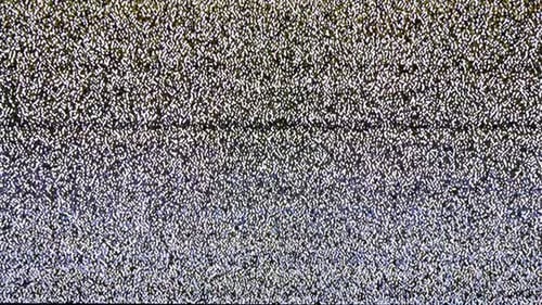 Static Noise on Television Screen Creates Chaotic Glitch