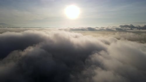 Aerial fly over morning low cloud