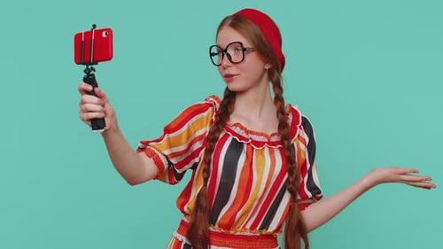 Girl Recording Video with Smartphone on Tripod