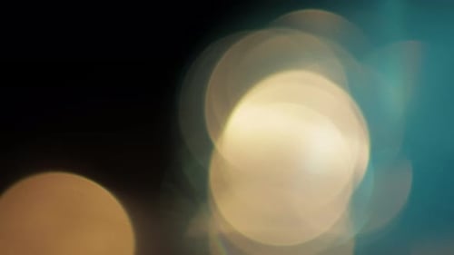 Multicolored Light Leaks Footage on Black Background. Stylizing Video, Transitions. Bokeh Effect