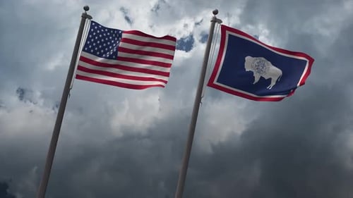 Waving United States and Wyoming State Flags