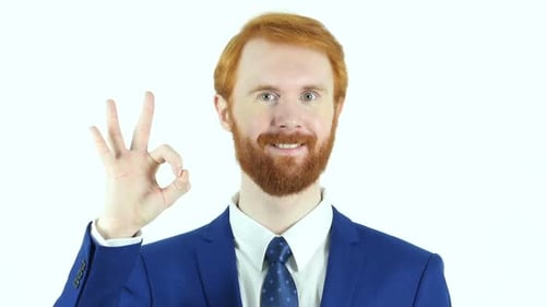 Man in Suit Gives OK Hand Sign