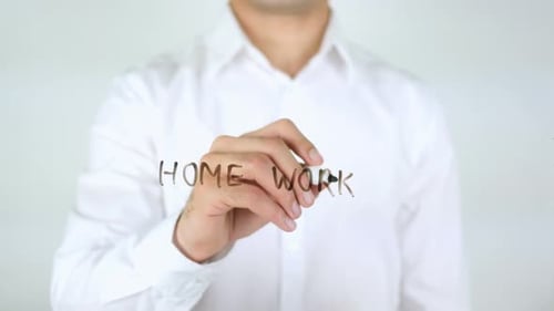 Man Writes Homework on Clear Surface