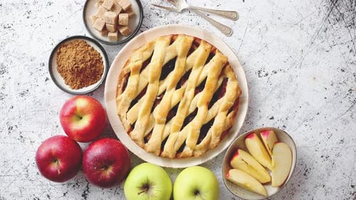 Delicious Apple Pie Cake with a Fresh Fruits, Brown and Powder Sugar