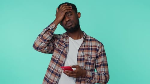 Young Adult Receives Bad News on Phone