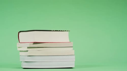 Placing a book over other books