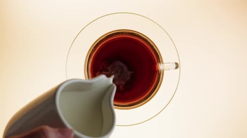 Black Tea with Milk in Cup Top View