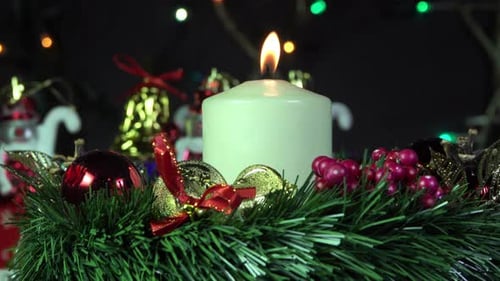 Festive Christmas Decorations with Burning Candle