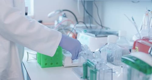 Close up of a Scientist working in a medical laboratory conducting experiments