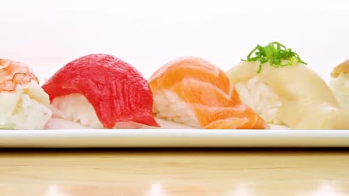 Camera Moves Pass A Plate Of Sushi