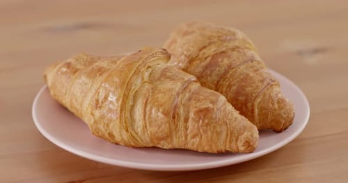 Golden Brown Croissants on a Plate