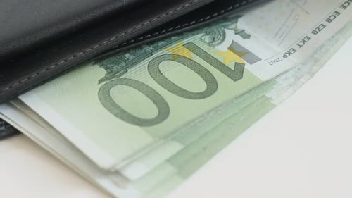 Euro Bills Stacked in a Black Wallet