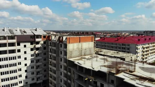 Aerial View of Buildings Under Construction on Sunny Day