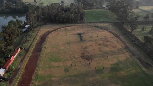 Aerial View of People on a Sports Field