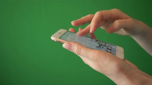 Girl Use Phone Isolated On Chroma Key Green Screen Background