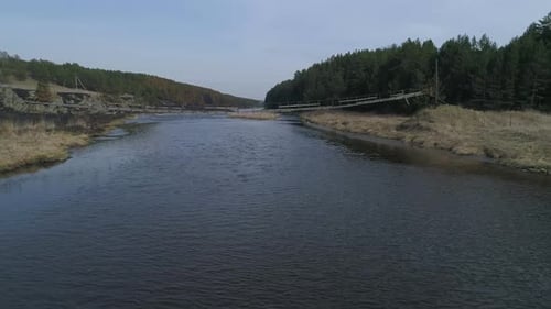 Aerial drone view of Old suspension bridge over the river 06