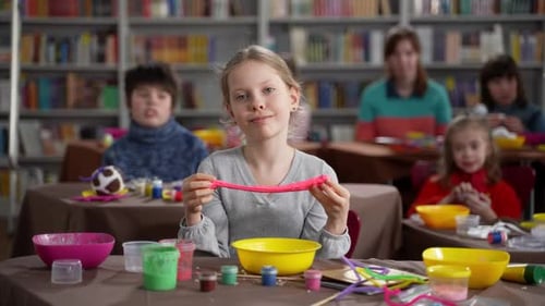 Children Making Arts and Crafts with Slime at School