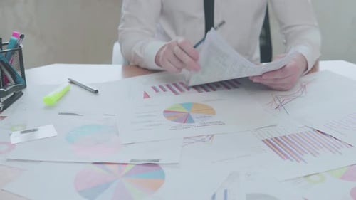 Businessman works with tax statistics