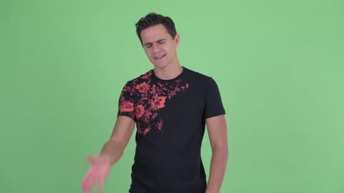 Confused Man Gesturing on Green Screen