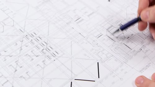Le
concepteur examine les données du bâtiment le plus complet du bâtiment. Gros plan