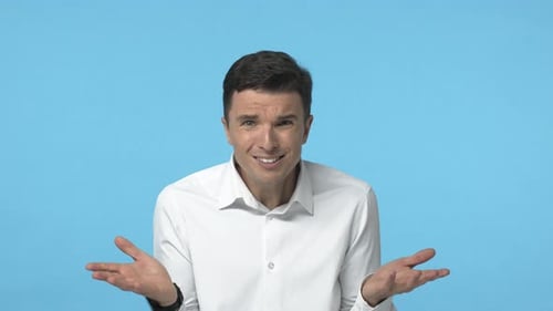 Man Shrugs and Makes Various Expressions on Blue