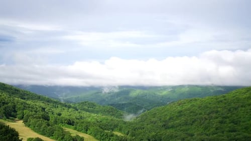 Rolling Green Mountains and Cloudscape