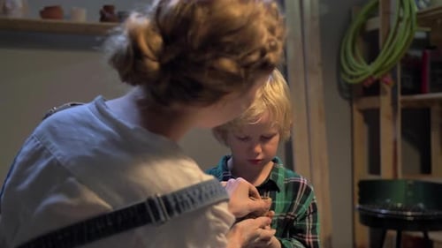Boy Sculpts a Cup with His Hands in the Workshop, Slow Motion
