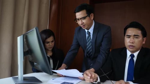 Angry boss dissatisfied with bad work result from employee in office