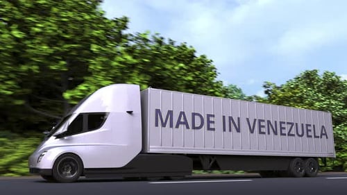 Modern Truck Carrying 'Made in Venezuela' on Highway