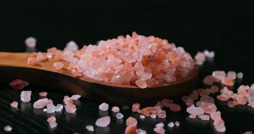 Pink Himalayan Salt in a Wooden Spoon