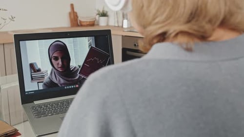 Female Colleagues Discussing Business on Video Call