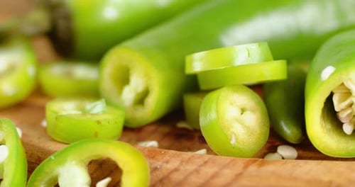 Cut Into Pieces Green Chili Peppers Rotates Slowly