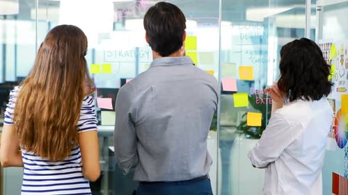 Team Collaborating on Strategy in Modern Office