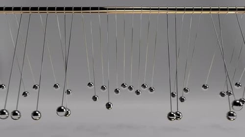 Dynamic Motion of Metallic Spheres Physics Simulation