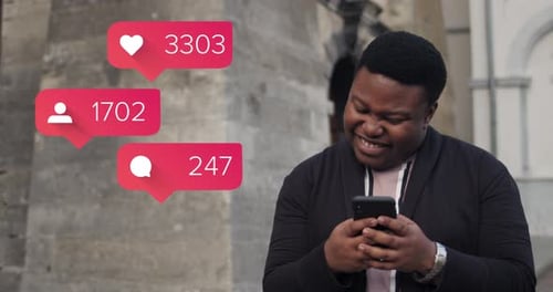 Cool Young Guy Absorbed in Using Smartphone and Tapping on His Forehead. Close Up of Man Playing
