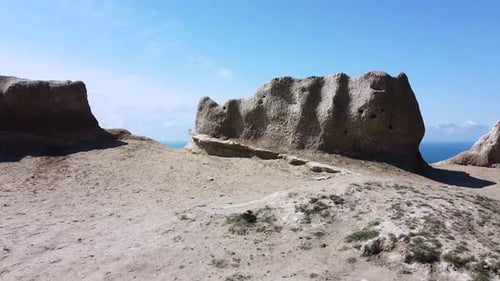Sandy Cliffs by the Sea on a Sunny Day