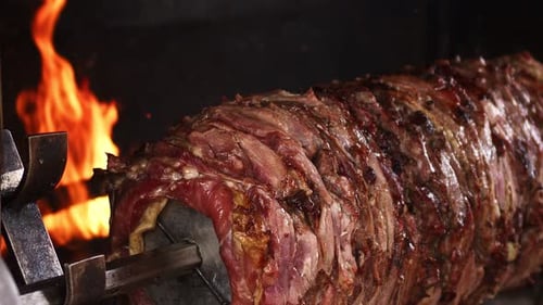 Delicious Doner Kebab Rotating by Flames