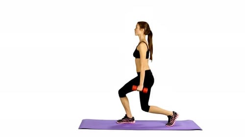 Young Woman Exercising with Dumbbell Doing Lunges
