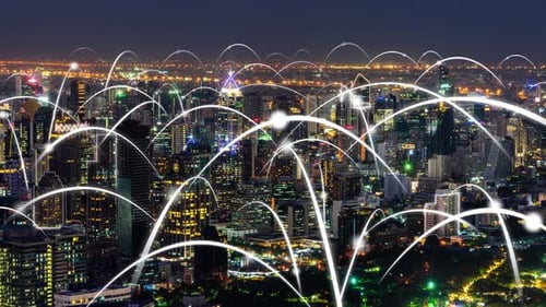 Animated Network Over Glowing City at Night